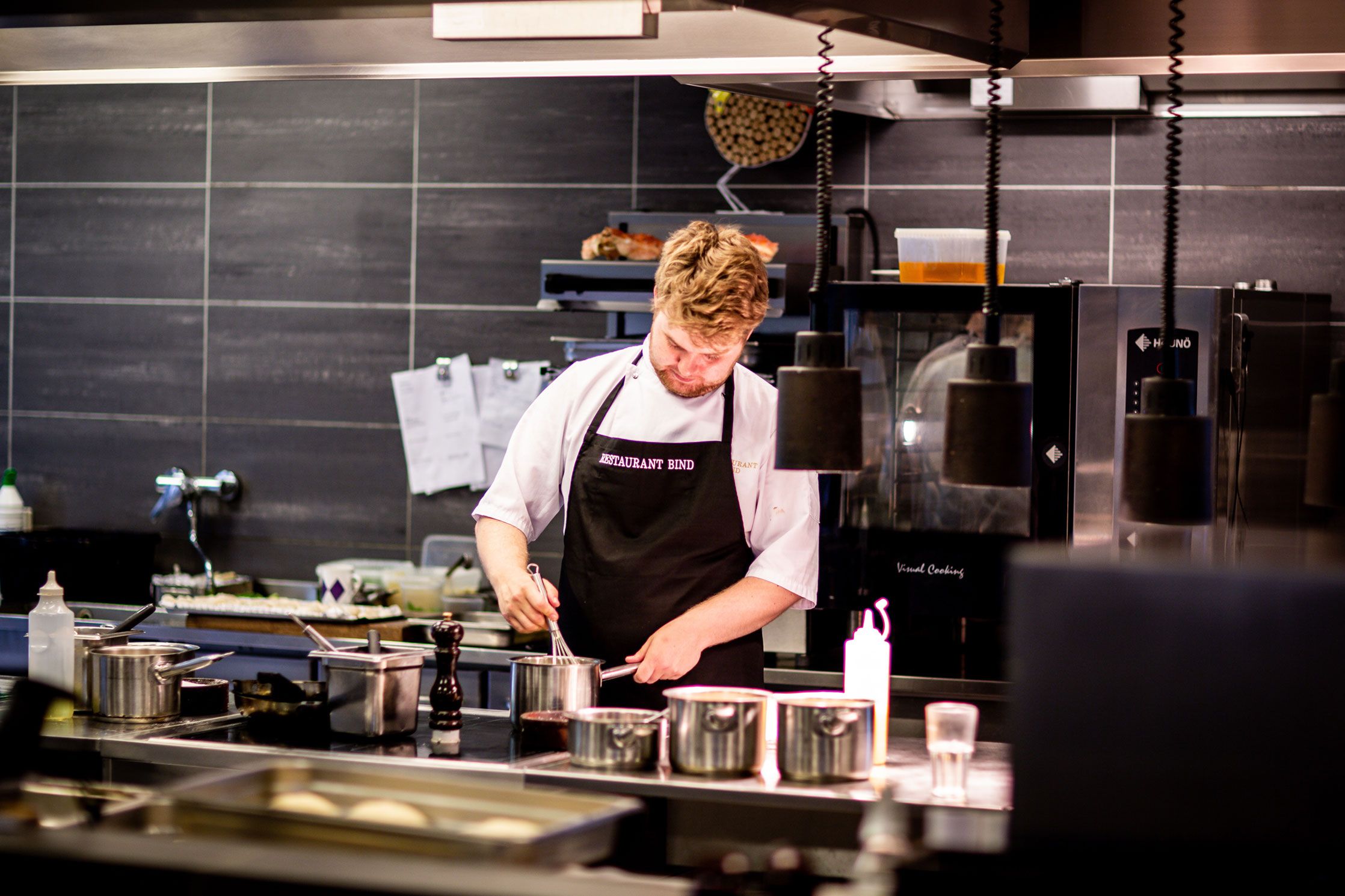 Chef Cooking in Kitchen Chef Cooking in Kitchen